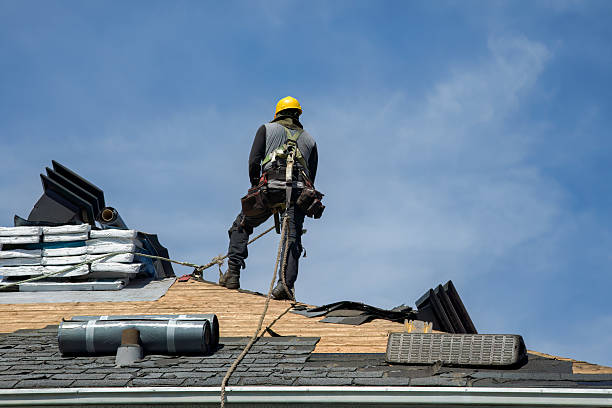 Professional Roof Replacement technician working in Medway, MA